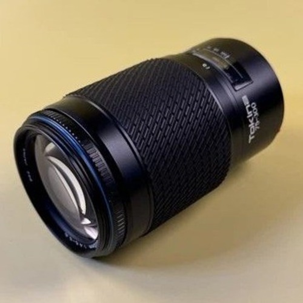 Tokina 75-300mm AF Zoom Lens for Minolta A Mount with 62mm Bower UV Filter Japan